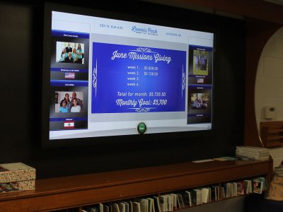 70 inch TV with touchscreen overlay and 2 inch safety frame image